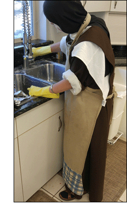 carmelite nun, washing out the sink, kitchen aprons