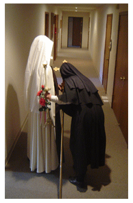 Postulant kisses the crucifix before the ceremony Postulant kisses the crucifix before the ceremony