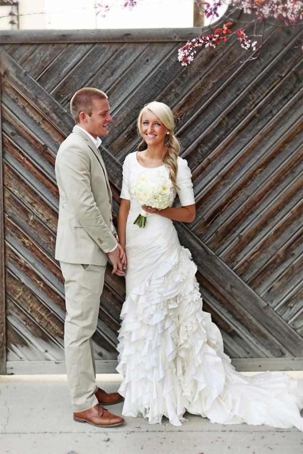 T Barton Photography via The Well Traveled Wife / Wedding Dress by Pronovias