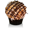 Rich Chocolate cake, vanilla buttercream, toasted coconut, drizzled with caramel and chocolate ganache