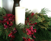 Stunning Christmas decorations...evergreens and Eco-friendly red rose petals. Candles not included