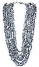 We carry this nickel bracelet in size 18 in. Its width is 6 ¼ in. Custom sizes are available with 8-week delivery. For help with sizing, please contact us by phone: Shop hours are 10:00 - 6:00 daily, Central Time, from May through December, and 10:30 - 5:00 January through April.