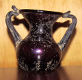 Ancient Roman colored glass bottle