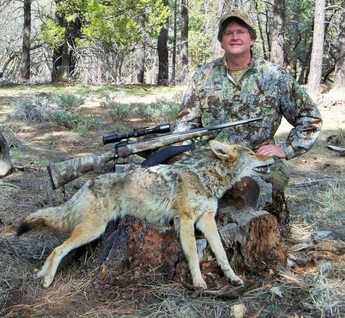 Our store manager, AP Jones with a prime Arizona coyote Our founder, AP Jones with Arizona coyote