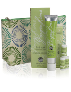 green block printed canvas cosmetic bag with green lotion tube and mini lip balms
