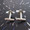 Tiny Star Wars Micro Machine toys are attached to cufflinks findings