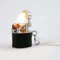 Vintage Lighter Necklace really works!

These are totally cool gadgets you can wear, the hottest functional jewelry around.