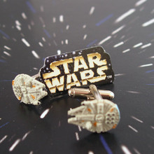 Go to hyperdrive with these Authentic Star Wars mini Millennium Falcons on your sleeve.