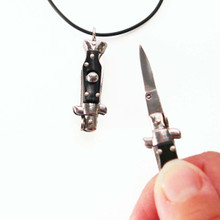 YOU gNeek's YOU Are Sooo Dangerous Switchblade Necklace shown here in the flicked open position and closed (on your necklace) position.