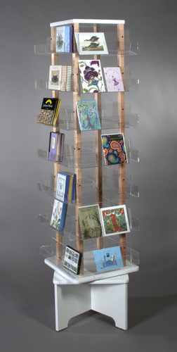 Sturdy, elegant, clear acrylic floor spinner is perfect for displaying greeting cards, postcards, and other items.