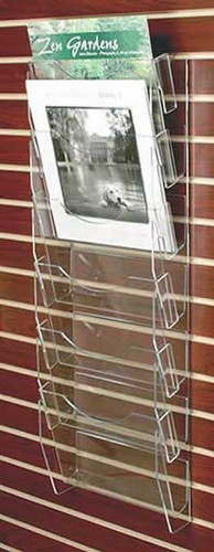 Clear acrylic slatwall mounted calendar rack with six pockets.