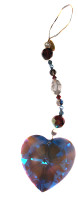Blue Sapphire Heart charm
Window Prism /Ornament/ Suncatcher 
Limited Edition (1 of 30) 
$85

MADE WITH SWAROVSKI ELEMENTS and STRASS® Swarovski Crystals. 

Each one was created as a limited edition item. Only 30 of each has been made and are being offered for a short period of time. They are a great way to bring something ornate and unusual into your home whether it be to catch some sun in your room, dress up a vase or decorate the tie-backs on your curtains. 


Item SKU: KCBH

 	•Measures 7" lenght
 	•Made with CRYSTALLIZED™– Swarovski® Elements and finished with a 50m Strass® Swarovski® pendent.
 	•15m crystal is a rare discontinued Swarovski® crystal, Peridot is a rare vintage Swarovski® crystal
 	•Handcrafted by Designer Karen Curtis
 	• Colors include: crystal, burgundy, montana, pearl, metallic, lt azure and sapphire-ab