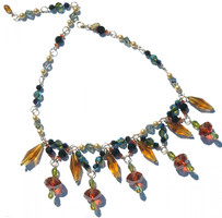 One of a kind chunky Swarovski crystal necklace.  Beautiful and unusual large shapes and colored Swarovski elements.  Made on gold filled metal, colors include topaz,burnt orange,lime,light azure blue, navy, and champagne colored pearl elements