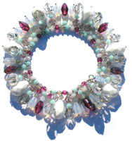 Made with SWAROVSKI ELEMENTS

1 of 2

Sterling Silver 

Hand crafted by designer in NYC

Colors: Chalk White, White Opal, Fuchsia, Blue Mint, Sand Opal and Crystal Silver Shade 

* All Chalk White Crystals are very Rare Antique SWAROVSKI ELEMENTS that date back to the 1930s

Other Details: 8mm Sterling Silver Jumprings and Sterling Silver clasp and hang tag complete the bracelet. 
(on memory wire to keep its form)