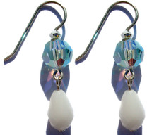 Single drop earrings using sterling silver and Swarovski elements. Colors include antique chalk white crystals and light azure blue.