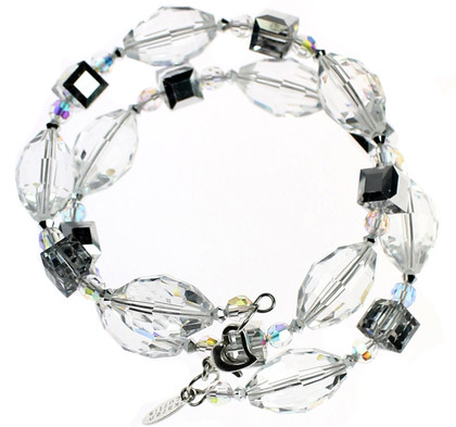 Hand crafted Bangle Bracelet made with Swarovski® Elements.  Limited edition with clear and silver crystals