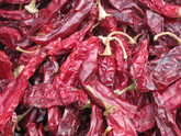 Choose from X-hot, Hot, Medium, Mild sun-dried chile pods.
Comes in a 5 lb. box with stems, seeds.