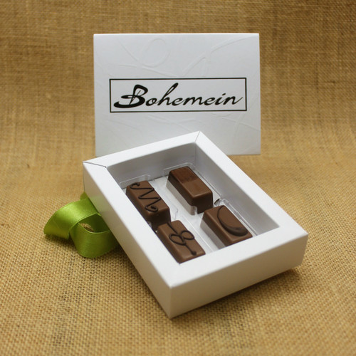 Bohemein 4 Milk Chocolates Gift Box includes: Maple Cream, Vanilla Cream Milk, Chocolate Caramel, Cointreau Ganache.