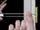 Hold ends of straps between thumb and forefinger and pull toward you until channel rests flush behind wall. Slide plastic cap along straps with other hand until flange of cap is flush with wall.