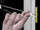 Snap straps at wall by pushing side to side, snapping off straps level with flange of cap.
