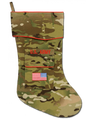 The Army MultiCam Christmas stocking is the newest addition to the collection. MultiCam is the fabric used by the Army for uniforms warn by Soldiers deployed in Afghanistan. It is not widely recognized stateside by the general public. The stocking is trimmed in scarlet piping with the "reverse American flag" embroidered on the stocking pocket. Above the pocket is the embroidered "U.S. ARMY" service tape. The price of this stocking is higher due to the higher cost per yard of this fabric.