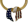 Swarovski crystal with enamel gold-plate pendant in a looping design. Chain sold separately.
