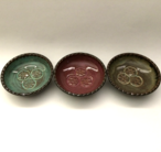 Dipping bowls shown here with turquoise, plum and iron lustre inside and turtle shell outside.