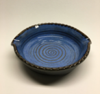 Brie baker shown her with Quinn's blue glaze inside and turtle shell glaze outside.