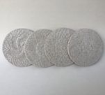 Set of 4 coasters shown in snow glaze.