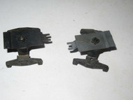 LIONEL PART - TWO METAL TRUCK FRAMES WITH HOPPER CLIPS - GOOD- SR131