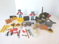 ASST LOT OF PIRATE BOOTY FIGURES BOAT PIRATES CHESTS CANNON BALLS CANNON... H23