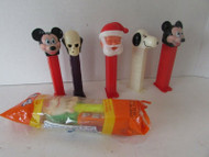 6 PEZ DISPENSERS MICKEY MOUSE SNOOPY SANTA SKULL AND SLIMER L144