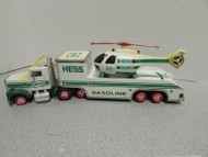HESS 1995 TRAILER WITH HELICOPTER YELLOWED WITH AGE NO BOX L247