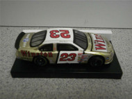 ACTION RACING COLLECTIBLES- 1/64TH SCALE JIMMY SPENCER 1999 TAURUS- NEW- M13