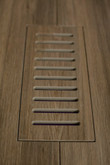 Porcelain vent cover made to match Corte Aged Teak Plank tile. Size -  4 Inch x 11 Inch