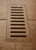 Porcelain vent cover made to match Lancaster Brown  tile. Size - 4 Inch x 11 Inch