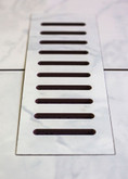 Ceramic vent cover made to match Carrara tile. Size - 5 Inch x 11 Inch
