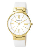 Anne Klein Round gold tone case with a white leather band and dial - White