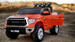 Tundra ride on Orange driver side front view doors