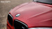 Red BMW X6 hood logo