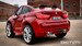 Red rear driver side view BMW X6 ride on