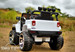 rear view tail lights rubber tires white lifted truck