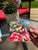 Bluebird and Hollyhock coasters by Holly Hanley