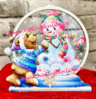 Snowglobe with snowgirl by Holly Hanley C 2025