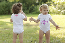 Our twin "Busy Butterfly" infant set features a purple butterfly on the front designed with our signature number 2! 
