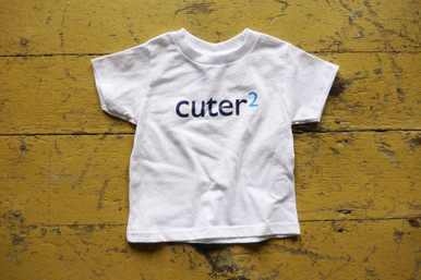 Our "Cuter Squared" twin toddler t-shirt set has the word cuter in a dark navy ink and the number 2 in blue ink.  Cuter2! 