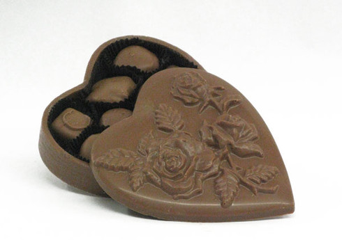 Chocolate heart box filled with assorted chocolates.
16 oz. all edible rose etched chocolate box.. Chocolate lovers dream!