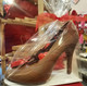Milk chocolate shoe filled with assorted chocolates.