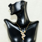 Survivor Tree Necklace. Sterling silver accented with garnet. 18" adjustable 18K gold vermeil chain