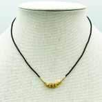 Black Seed Beads with Mixed Gold Focal Beads Necklace